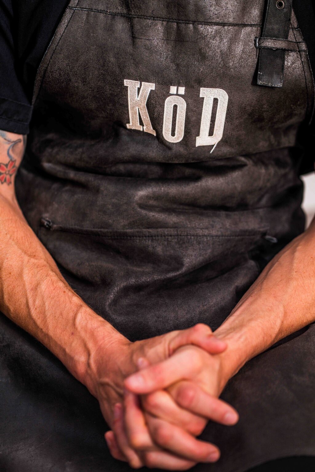 Kokk med KöD-forkle